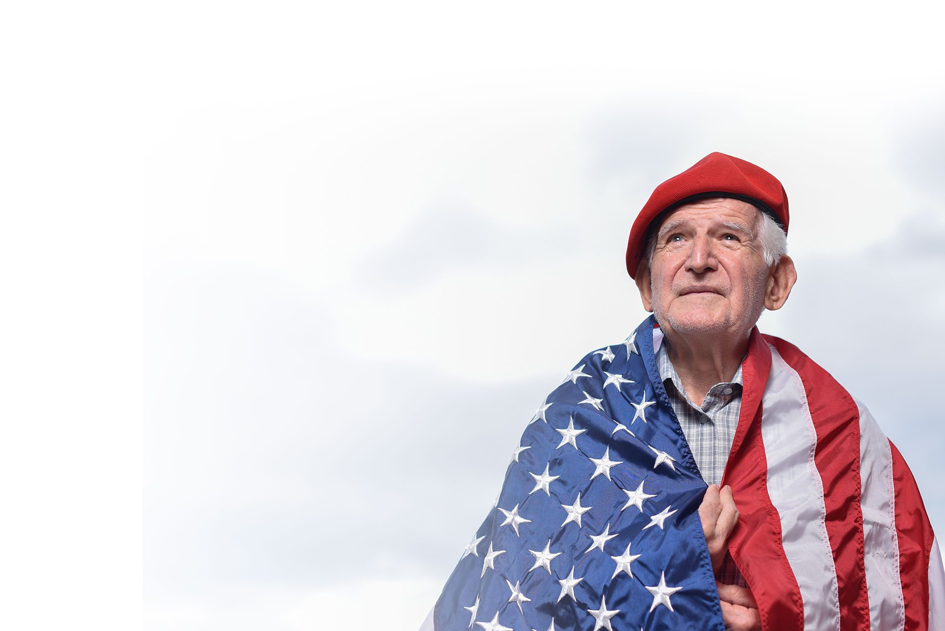 Senior Veteran Holding American Flag