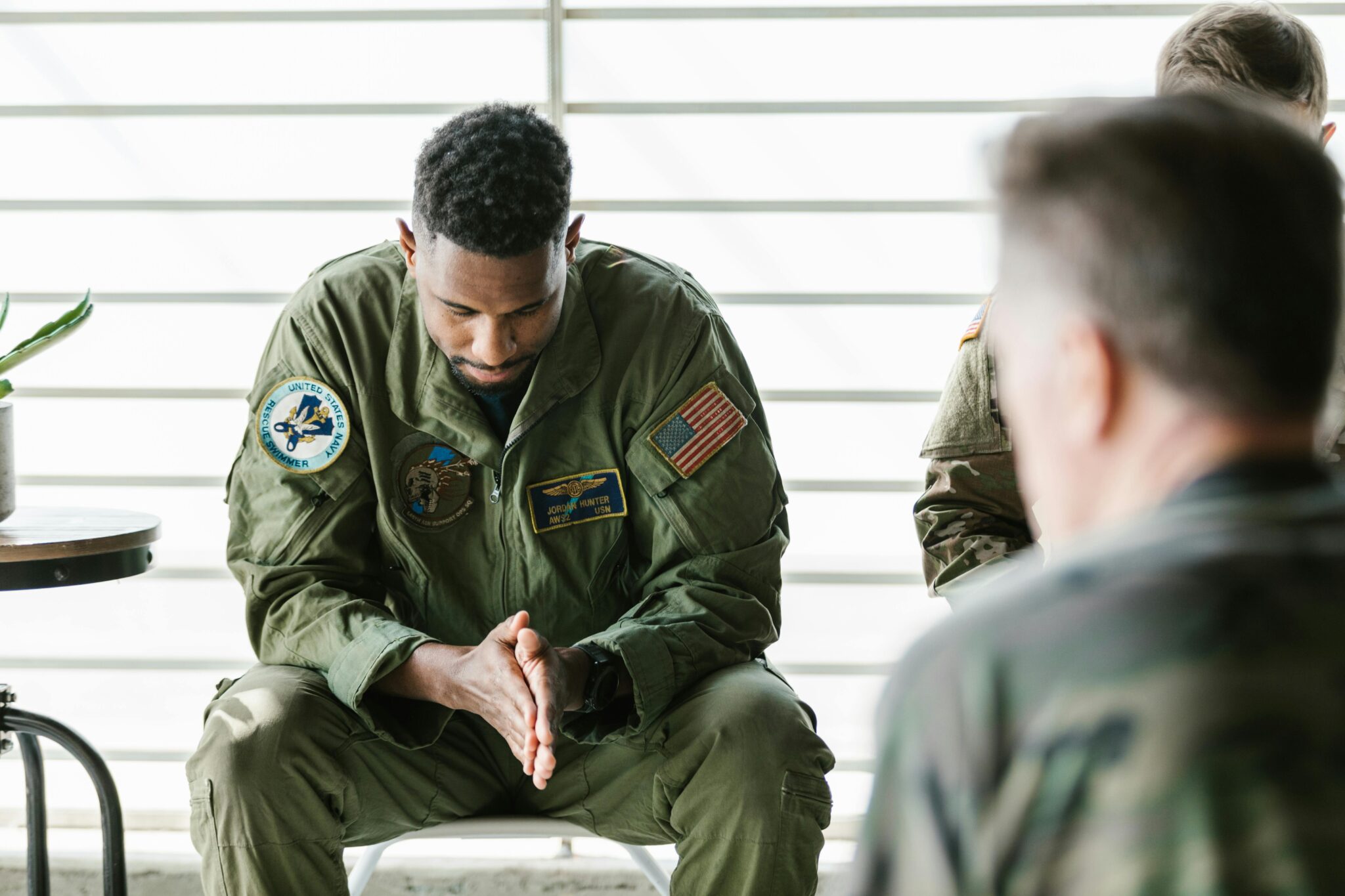 Male veteran sitting in treatment waiting room at UT Southwestern Medical Center